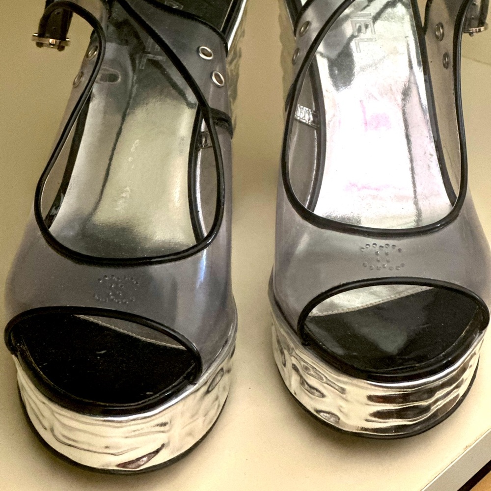 CHANEL Clear & Silver Logo Platform Slingback sandals.